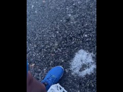 Pee outdoors while biking next to highway