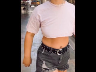 Walking the city Braless in an Underboob top.