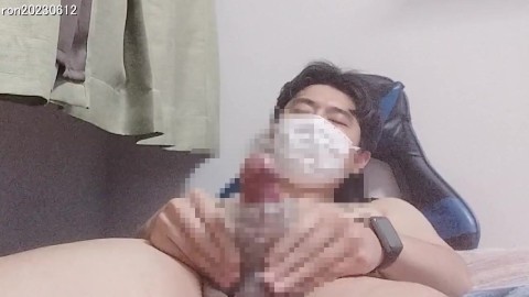 Japanese masturbates and ejaculates using a masturbator.