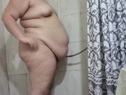 Preview 2 of Fatty inflates herself in the shower like a waterballoon and plays with herself