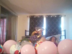 Milf with extreme long hair popping balloons and smoking cigarettes while filming up her own skirt