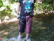 Preview 4 of German guy stands in a creek, pisses and jerks off his hard cock