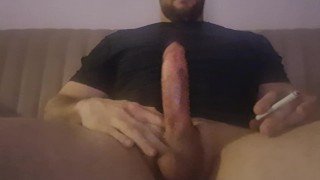 Extreme cumshot while smoke cigarettes and jerk big cock
