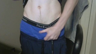 Fit guy slowly tease camera and shows underwear and pulls dick through hole and tease