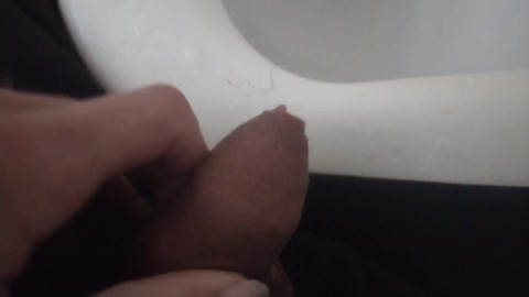 Blasting my cock in the bathroom