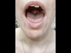 A nice blondie is coughing and spitting close up - Screenshot 2 of 16 - Spitting