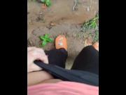 Preview 1 of Girl pissing in a puddle in the pouring rain on the side of the road