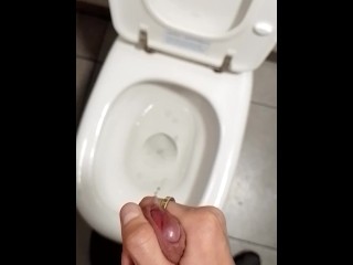 Teen Boy Jerks off in the Public Toilet Understall and make Cum