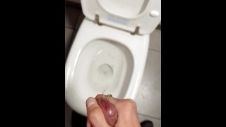 Teen boy jerks off in the public toilet Understall and make cum