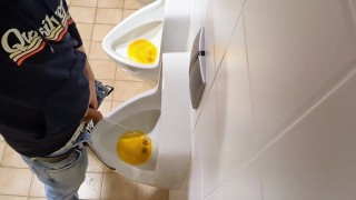 Amateur Guy Pissing In Public Urinal