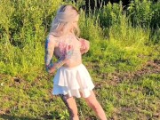 Preview 4 of Naughty blonde playing with her pussy on a meadow by the street