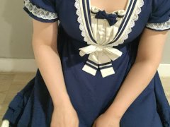 Crossdresser Wearing a Blue Dress and a Thick Diaper