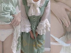 Crossdresser Wearing a Green Dress and a Pull-up Nappy