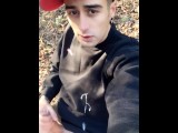 Huge cumshot on black shirt in the park