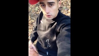 Huge cumshot on black shirt in the park