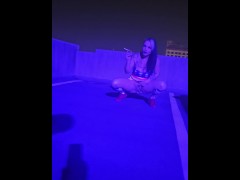Tattooed Milf KandyxB squats and pisses on rooftop while enjoying a cigarette during fireworks