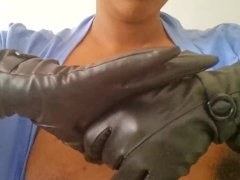 Ebony milf in black gloves and red lips sucks on a dildo imagining it to be a real dick