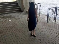 exhibitionist walks naked near the river