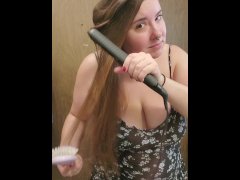 Young Wife Straighting her Hair for Date Night!