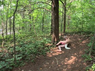 tattoo girl, wolf, anal plug tail, naked in the woods