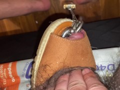 Masturbating with a few different shoes with 8mm pierced cock chained to a lock