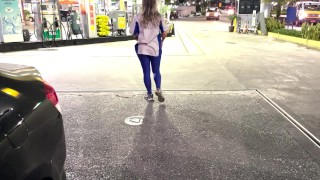 Gas station attendant undressed on the street