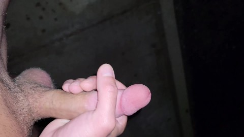 Boy jerking off in garage at night and cumming in view of the neighbors