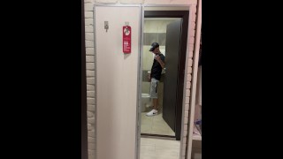 A GUY GOING TO THE TOILET
