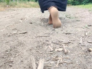 An Obedient Kitty has to Walk in Silk Socks in the Woods