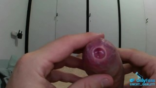 slow foreskin play on an uncut tight cock!