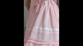 Crossdresser Wearing a Pink Dress and a Think Diaper 03