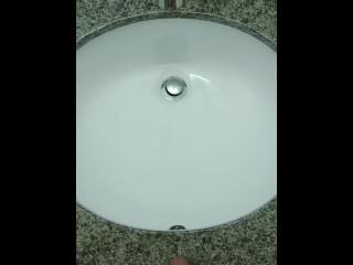 Piss in Hotel Sink