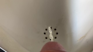Male urinal cock view