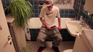 Young Man Urinating On Himself