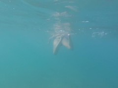 Aquatica's feet melted in the blue sea