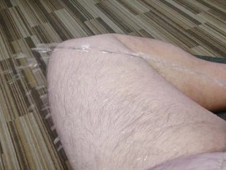 Piss on floor sitting in chair at hotel