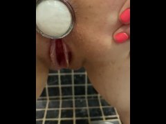 Pissing on her filled asshole