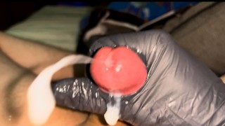 Handjob with black latex glove