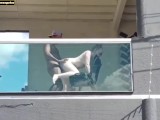 Neighbor films couple having sex on the balcony of the building she moans a lot