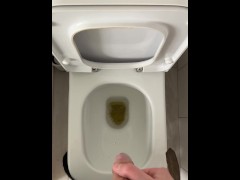 POV British guy pissing in the toilet