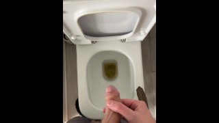 POV British guy pissing in the toilet