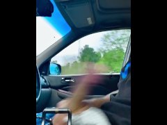 Stroking and slapping cock while driving