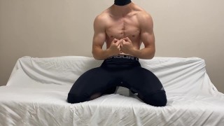 Muscle man after workout in black pantyhose