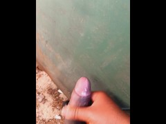 Rubbing It Out Behind Dumpster