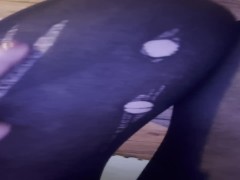 closeup ripped black nylons