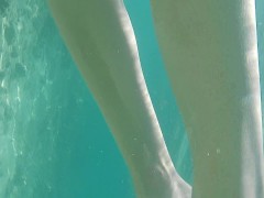sexy girl show her tits in the sea