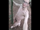 Very skinny british femboy running naked  purely naked inside a Forest with a selfie stick