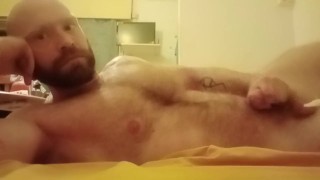 Laying down jerking it with cumshot