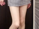 Japanese crossdresser in a very short skirt masturbates comfortably