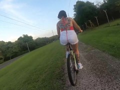 Riding a bike and showing my tits. Outdoor